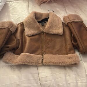 Brown leather and fur jacket worn once